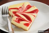 Luscious Strawberry Swirl Cheesecake Bars
