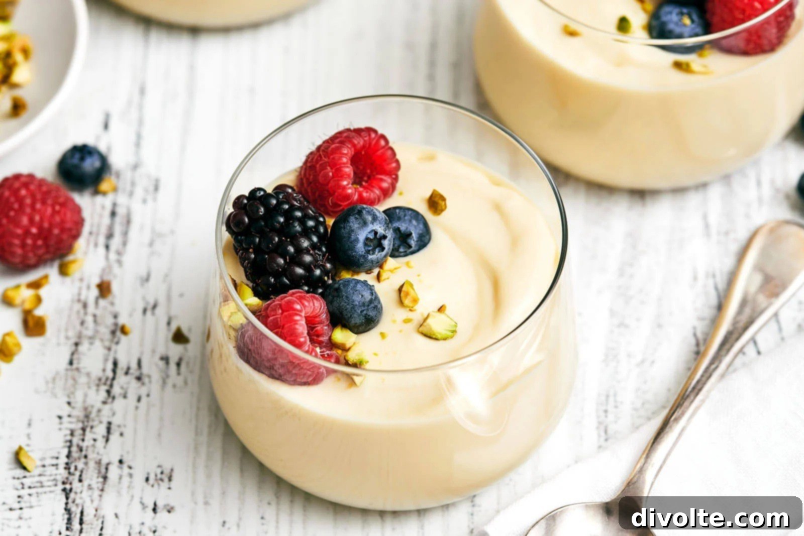 Delightful Homemade Custard, creamy and smooth, served in charming ramekins, ready to be enjoyed.