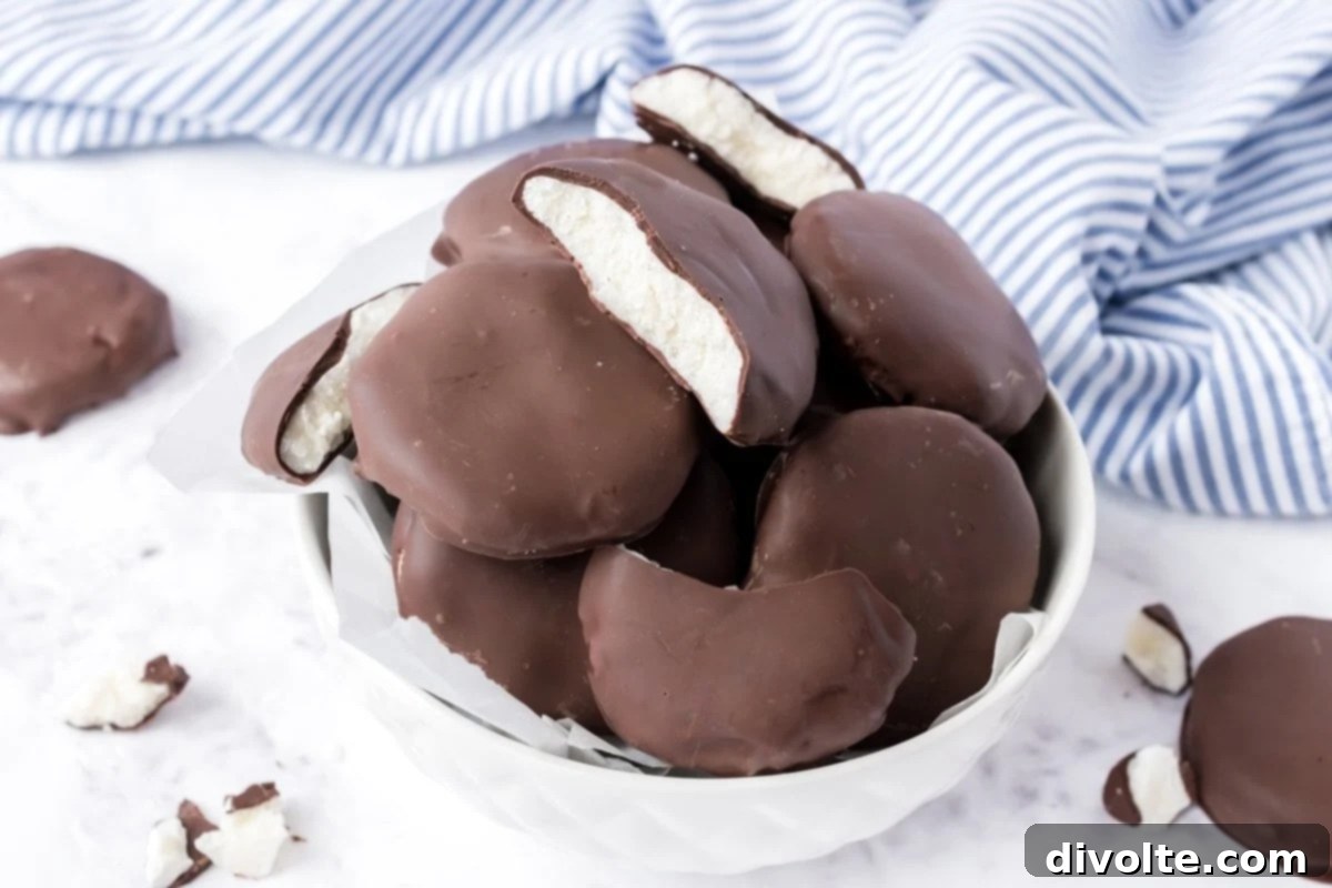 peppermint-patties-recipe - Delicious homemade chocolate-covered peppermint patties on parchment paper.