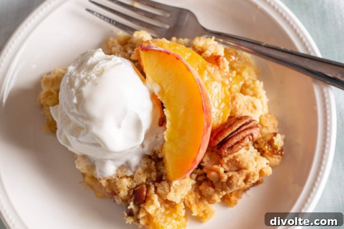 Easy-to-make Peach Dump Cake, a perfect dessert for any occasion, with golden brown topping.