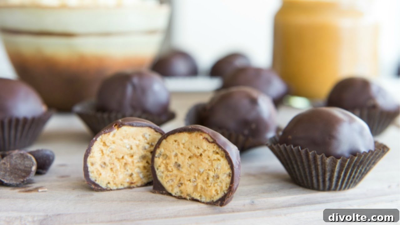 Decadent homemade dark chocolate bonbons with a glossy finish, arranged beautifully.