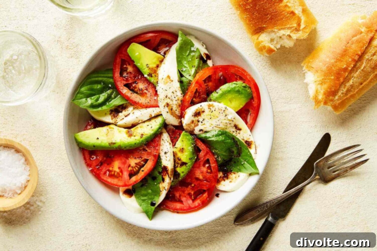 Creamy Avocado Caprese 2 caprese-avocado-recipe - vibrant and fresh salad with cherry tomatoes, mozzarella, basil, and avocado