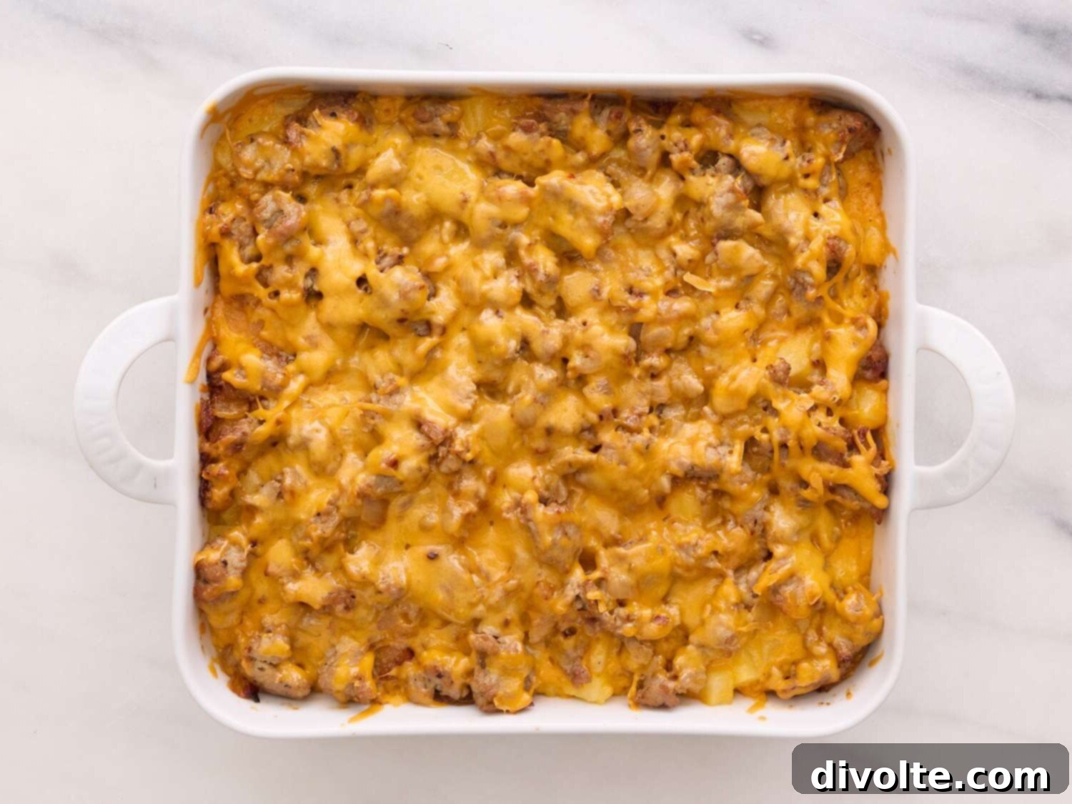 Golden Egg and Hash Brown Breakfast Bake 2 Delicious and easy to make egg and hash brown casserole, perfect for breakfast or brunch gatherings.