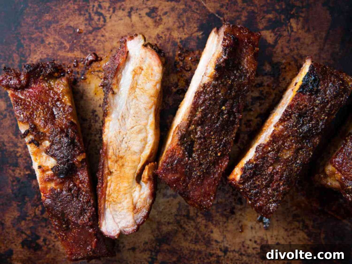 Fall-Off-The-Bone Oven Barbecue Rib Tips 2 Delicious oven-baked barbecue pork rib tips, glazed with BBQ sauce, served fresh