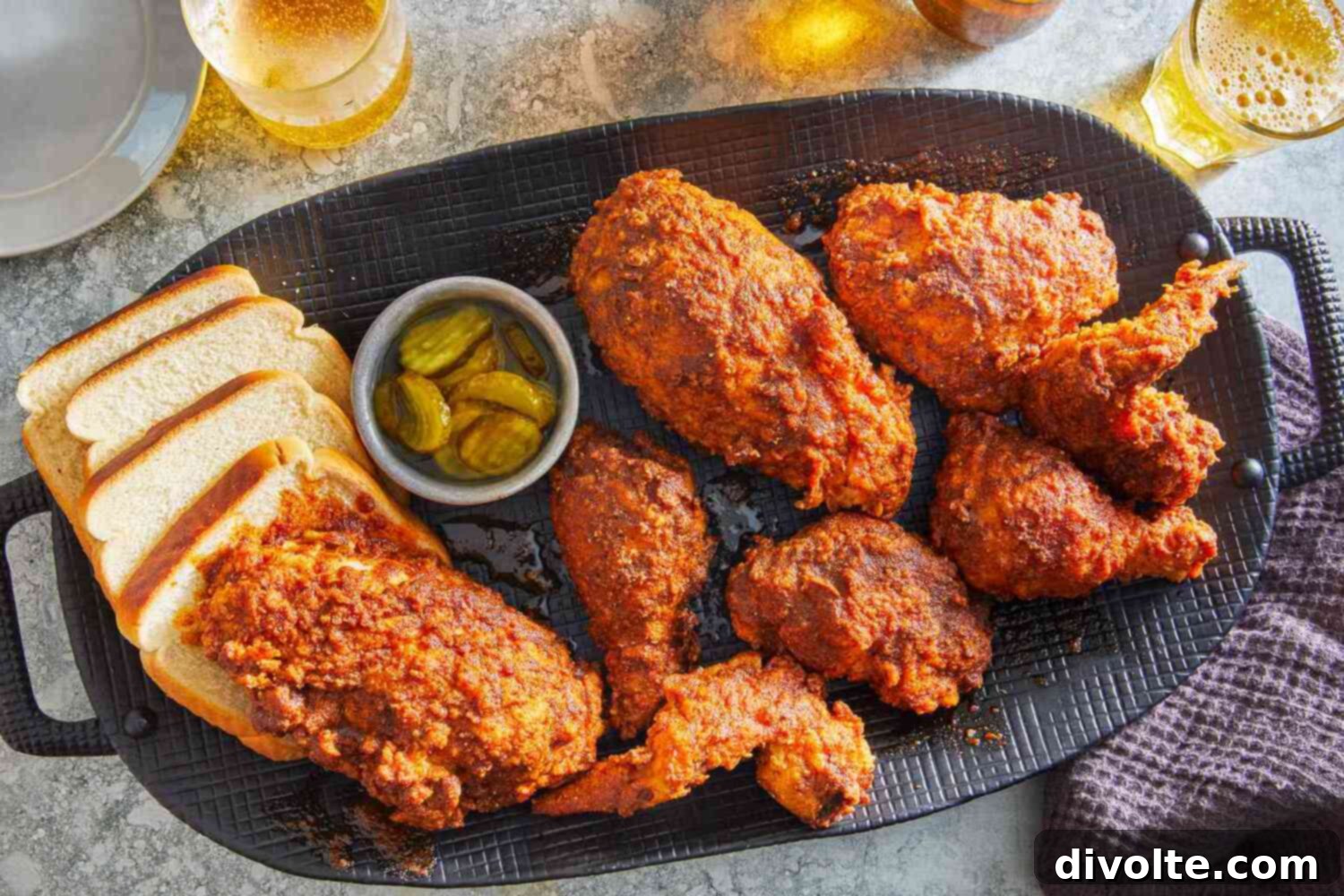 Perfectly fried Nashville hot chicken, golden brown and coated in spicy red oil